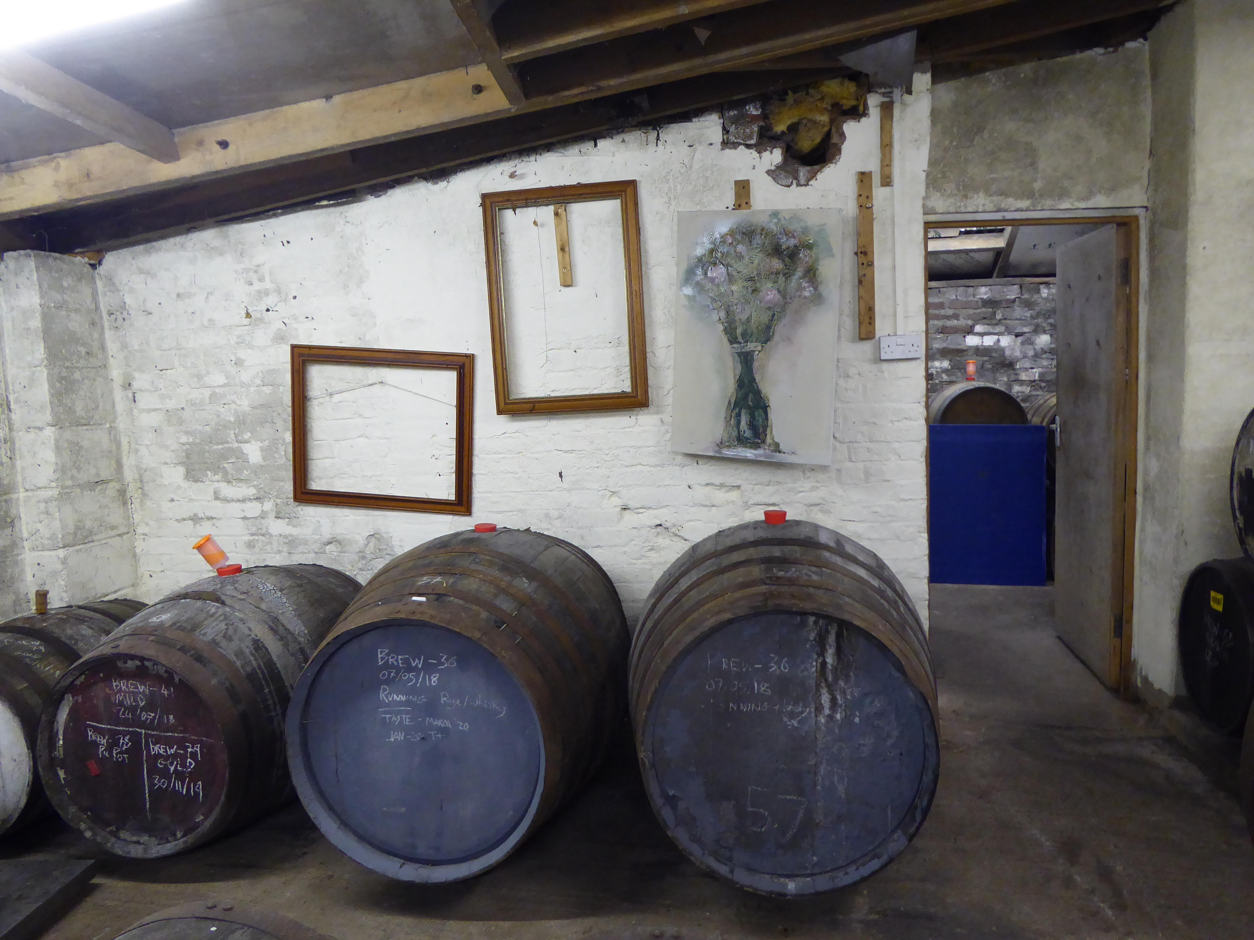 Maturing barrels at Mills Brewing