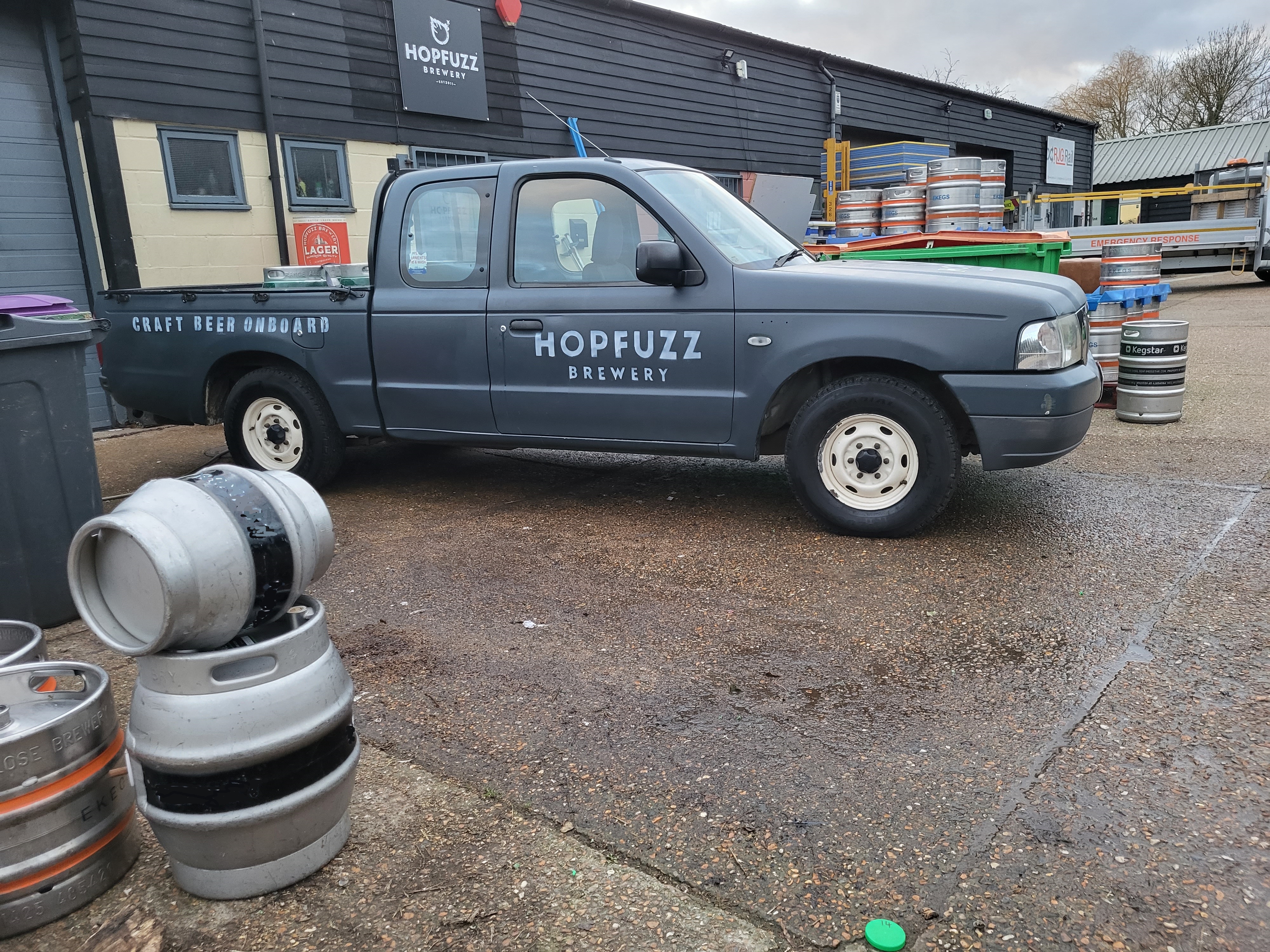 Outside Hop Fuzz Brewery West Hythe with pickup truck