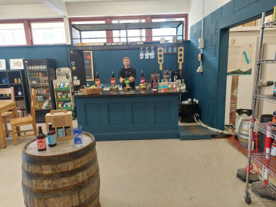 Brew Station Bar with Henry ready to serve